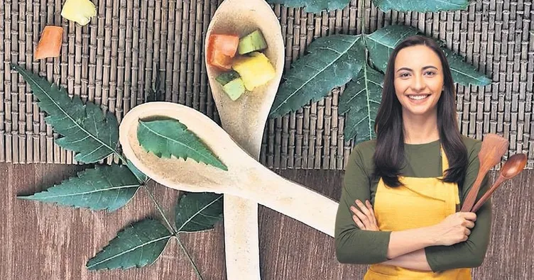 Taxta qaşıqlarla yemək bişirmək