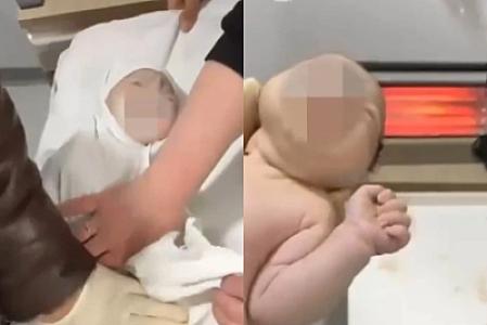 Qubada qadın körpəsini doğduqdan sonra